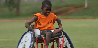 Children and adults with disabilities enjoying an inclusive community event