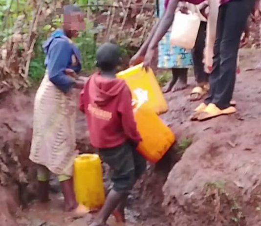 Rusizi Residents Struggle | Many Still Lack Water and Electricity Rusizi residents walking in a village area without water and electricity.