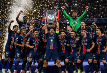 PSG players celebrate after winning the UEFA Champions League 2026 trophy following a penalty shootout victory over Arsenal.
